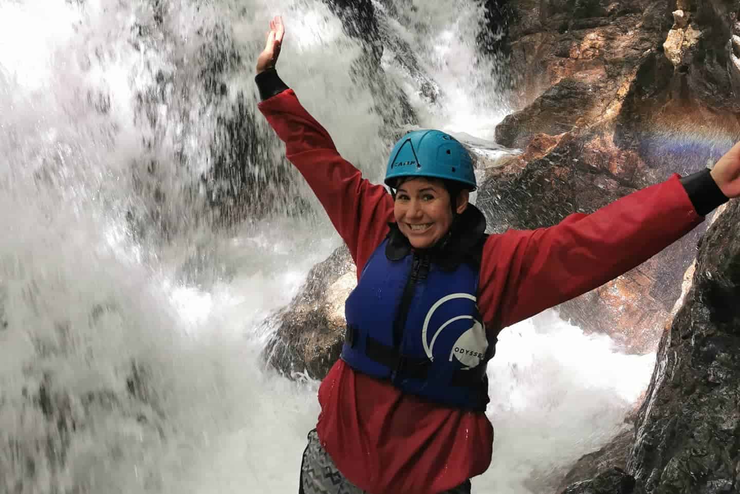 Esk Ghyll Scramble : client under a waterfall on an adventure activity